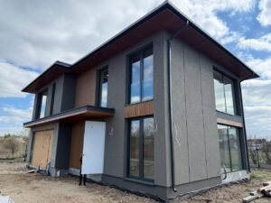 Acristalamiento panorámico en vivienda moderna en Varsovia con sistema de aluminio Aluprof